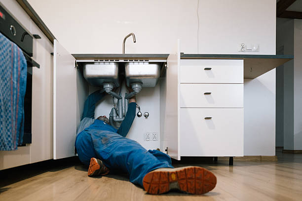 Professional Emergency Plumber technician working in Woodbury, CT
